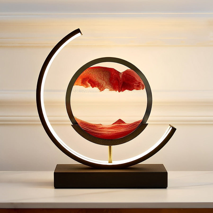 Decorative lamp with a circular design and mountain landscape on a neutral background
